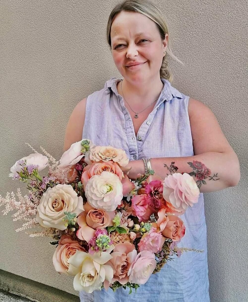 Alex with a Flower Baby Floristry bouquet